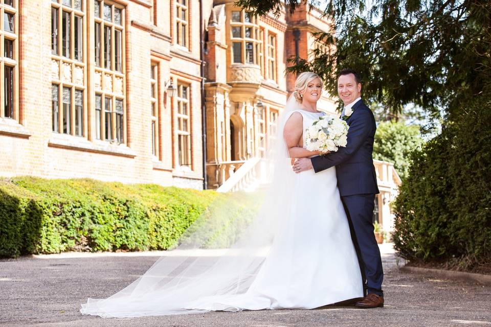 Couple outside the mansion at Woldingham School, Marden Park, Surrey