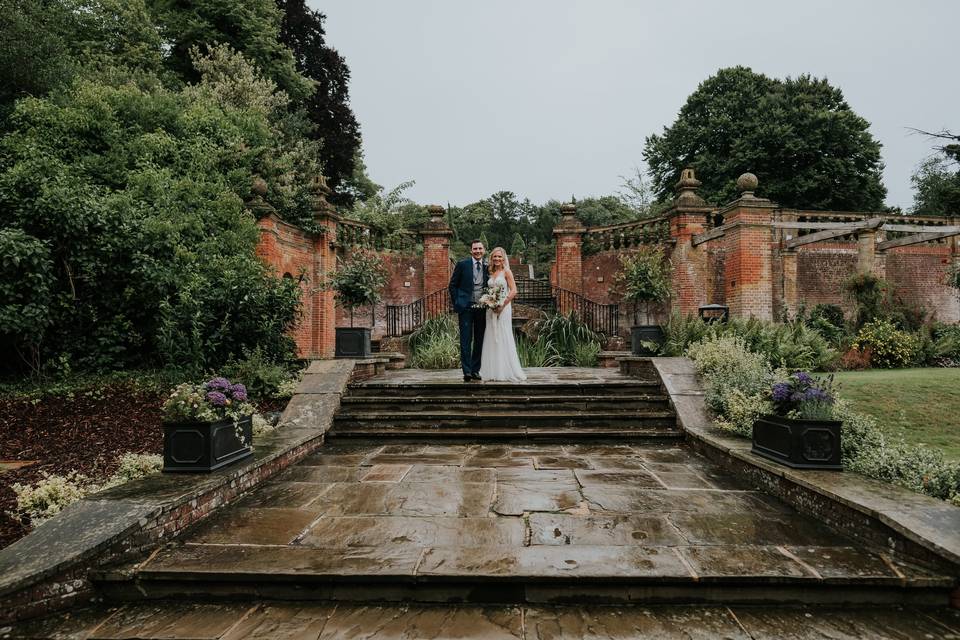 Pair in the mansion gardens after the rain at Woldingham School, Marden Park Surrey