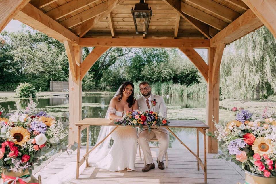 Bride and groom in pavilion