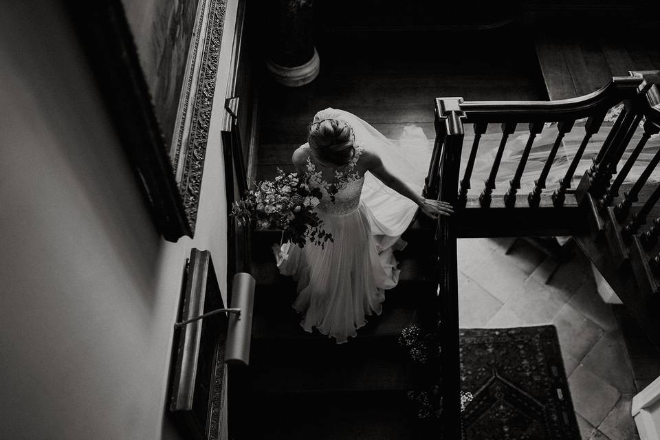 Bride walking down stairs