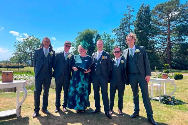 Standing with the Groomsmen.