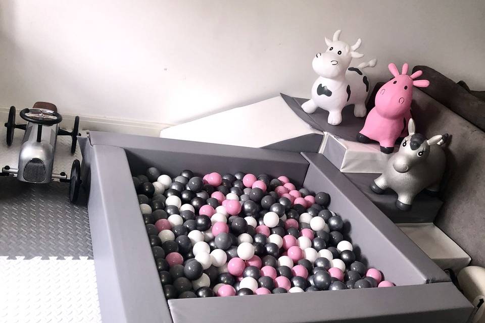Pink and grey ball pit