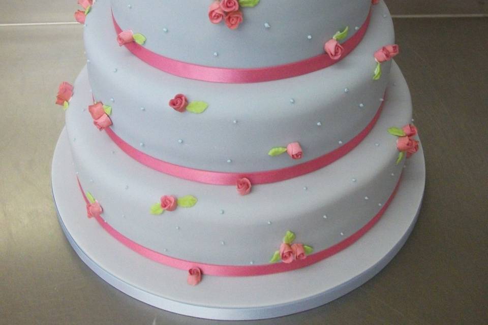 Blue icing, pink flowers