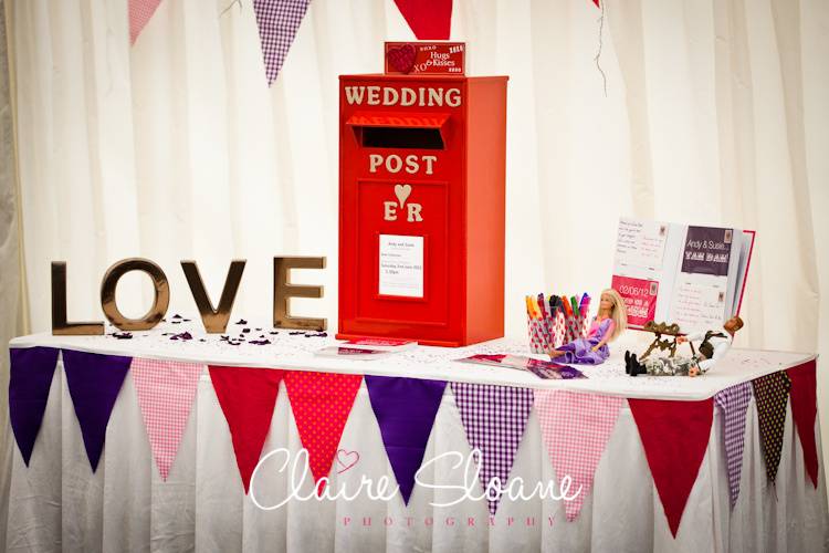 Red post box at a wedding