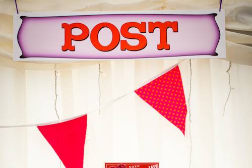 Red post box at a wedding