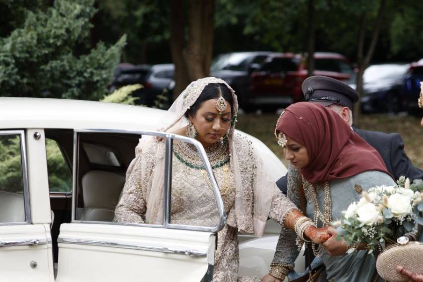 Bride coming out of car