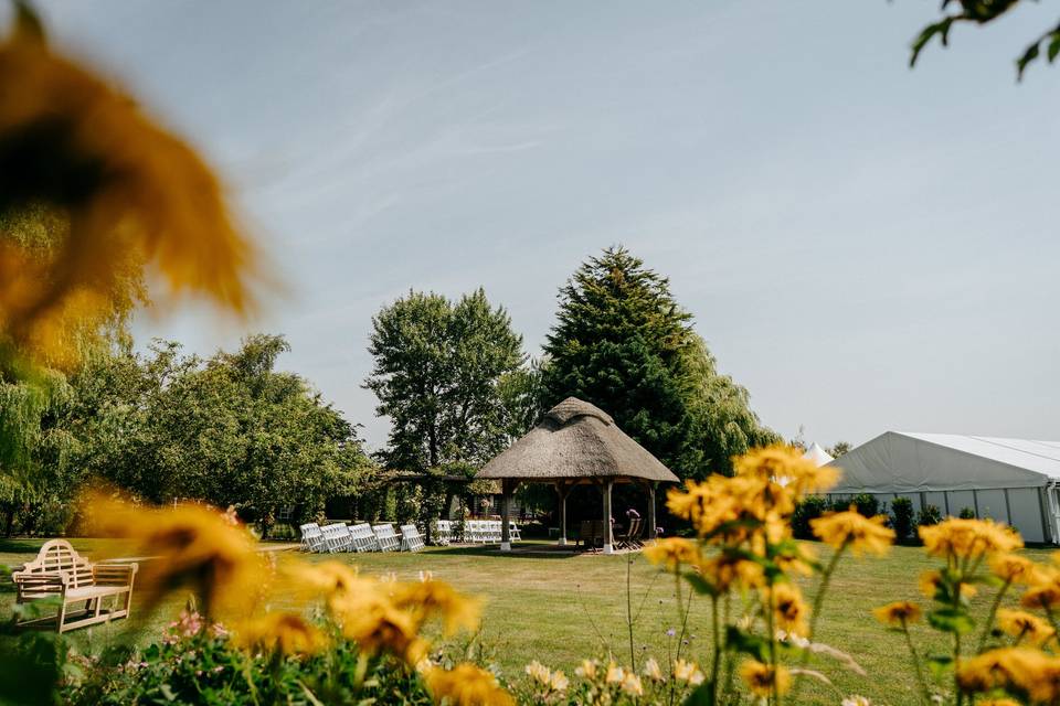 Barn ceremony space with piano