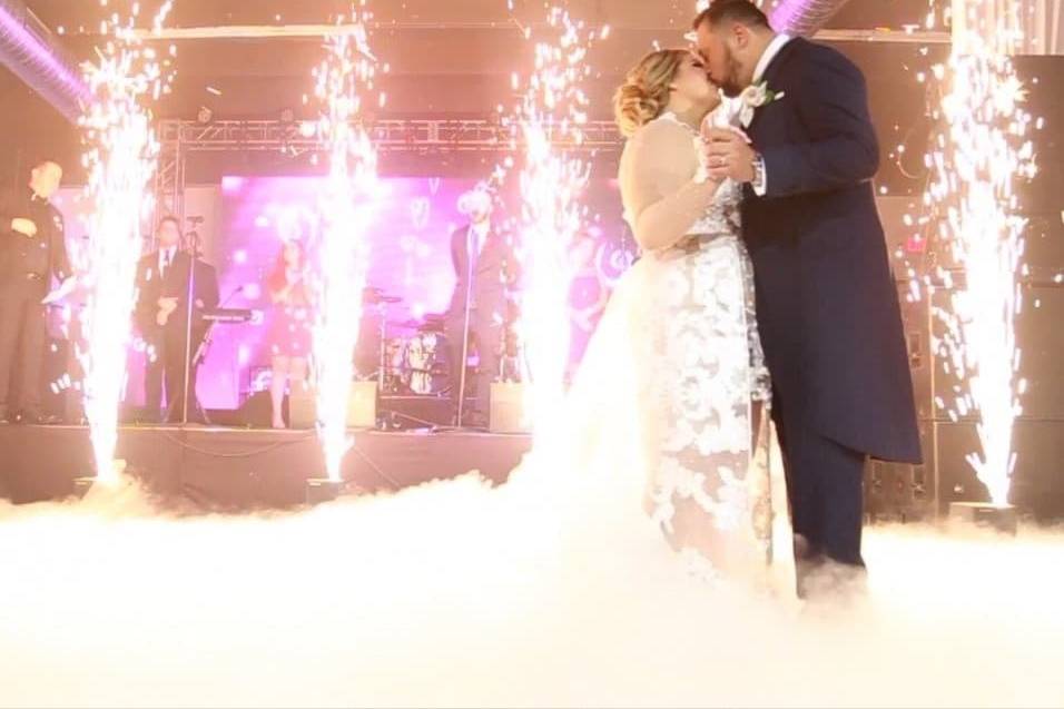 First kiss surrounded by cold sparklers