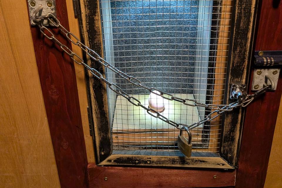 A egg locked behind chains