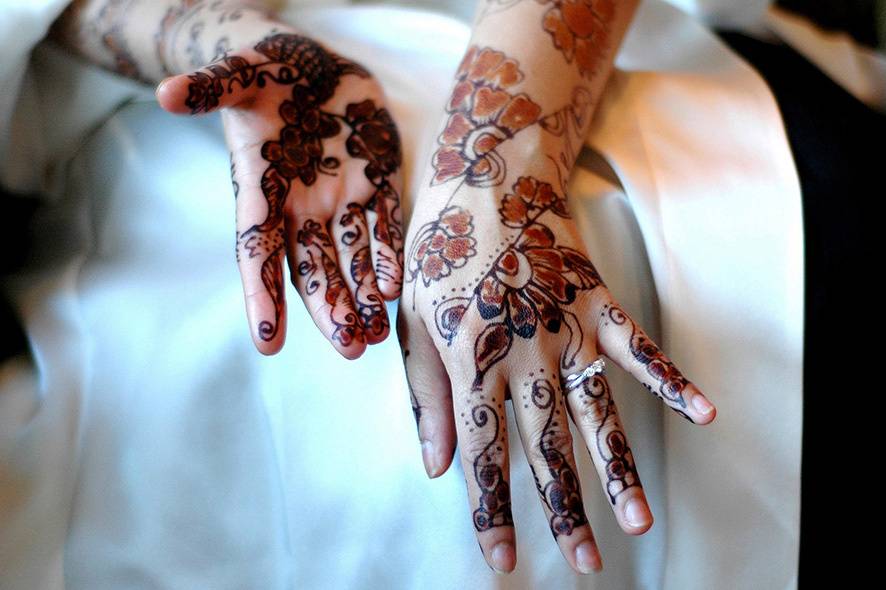 Close up of henna on hands