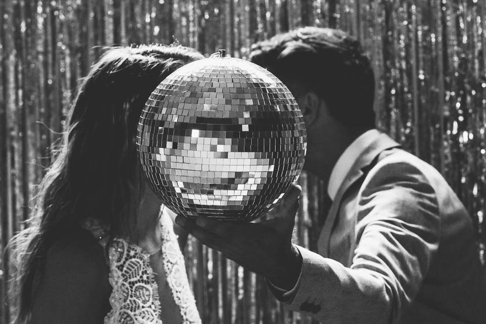 Couple holding mirror ball - Flash Forward Photography