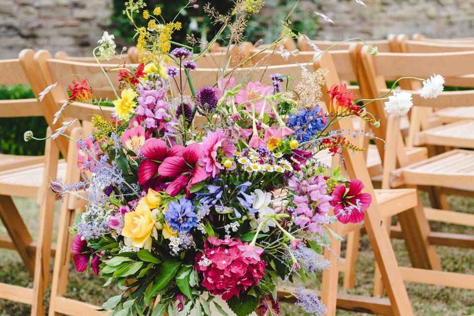 Colourful milk churn