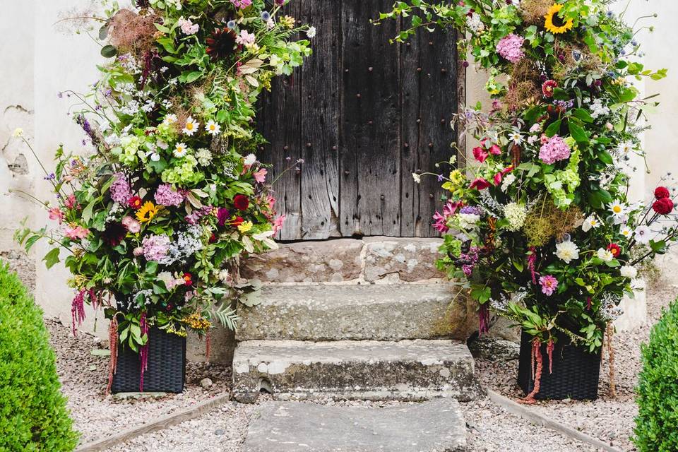 Broken floral arch
