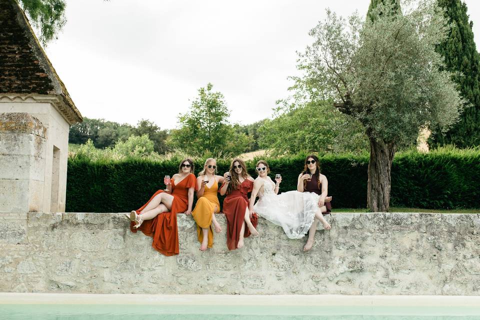 Bridesmaids chill by the pool