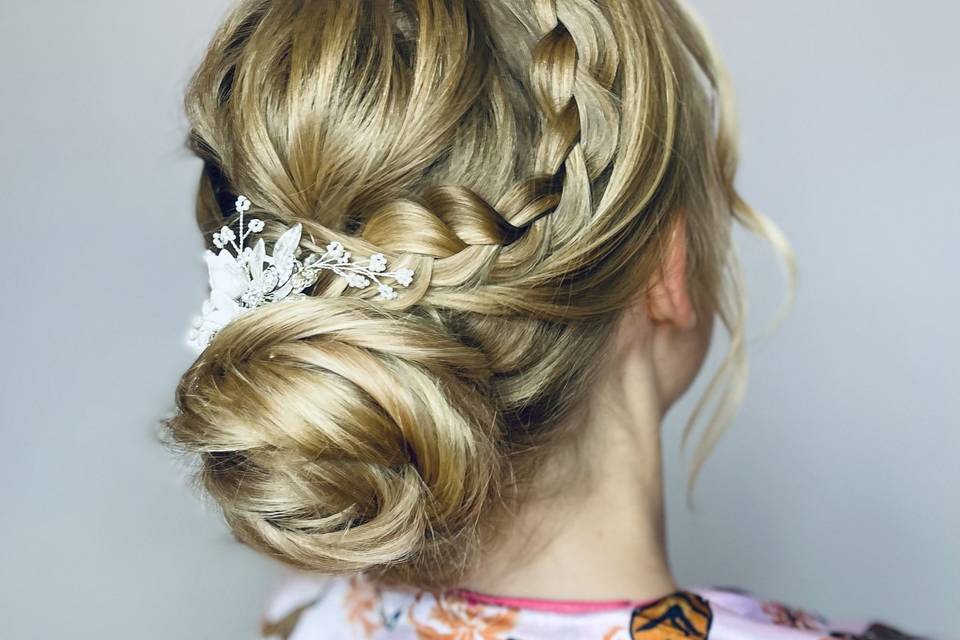 Textured and plaited low bun