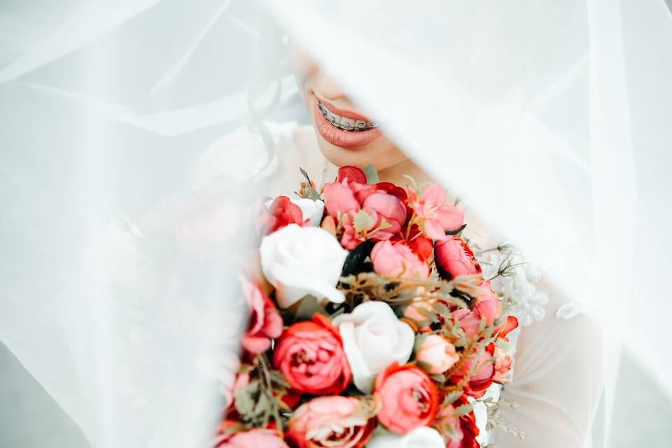 Pink peonies and red roses