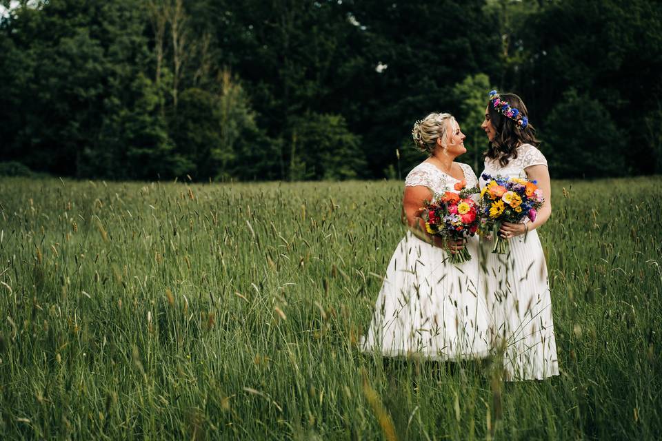 Couple with flowers in meadow