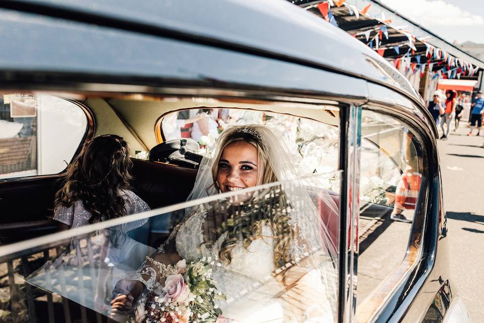 Bride in car