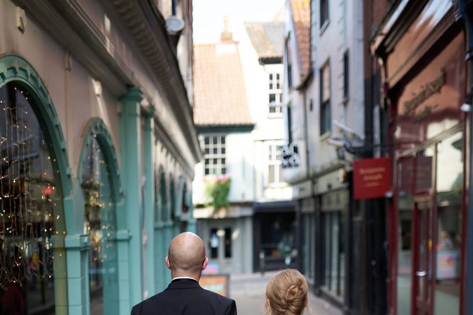 Couple walk to their reception