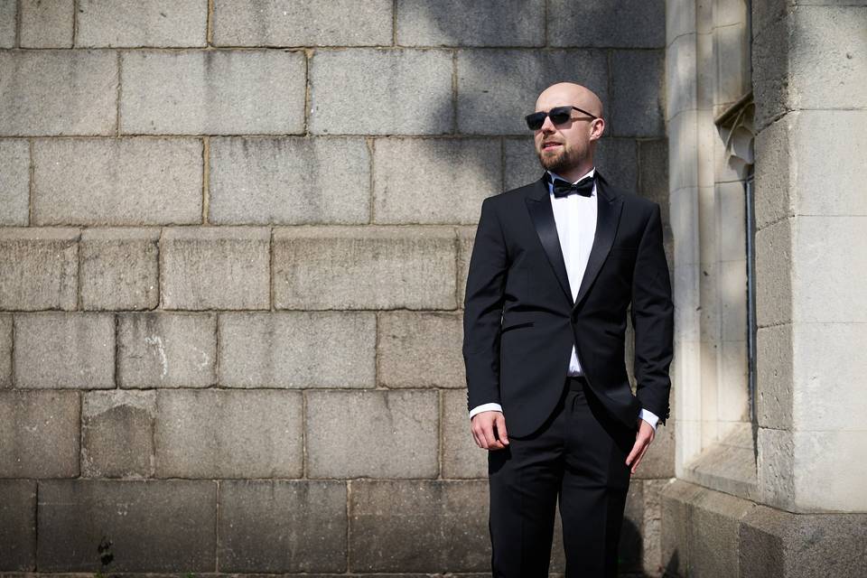 The groom waiting outside