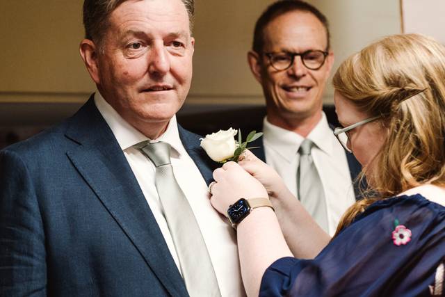 Helping with buttonholes