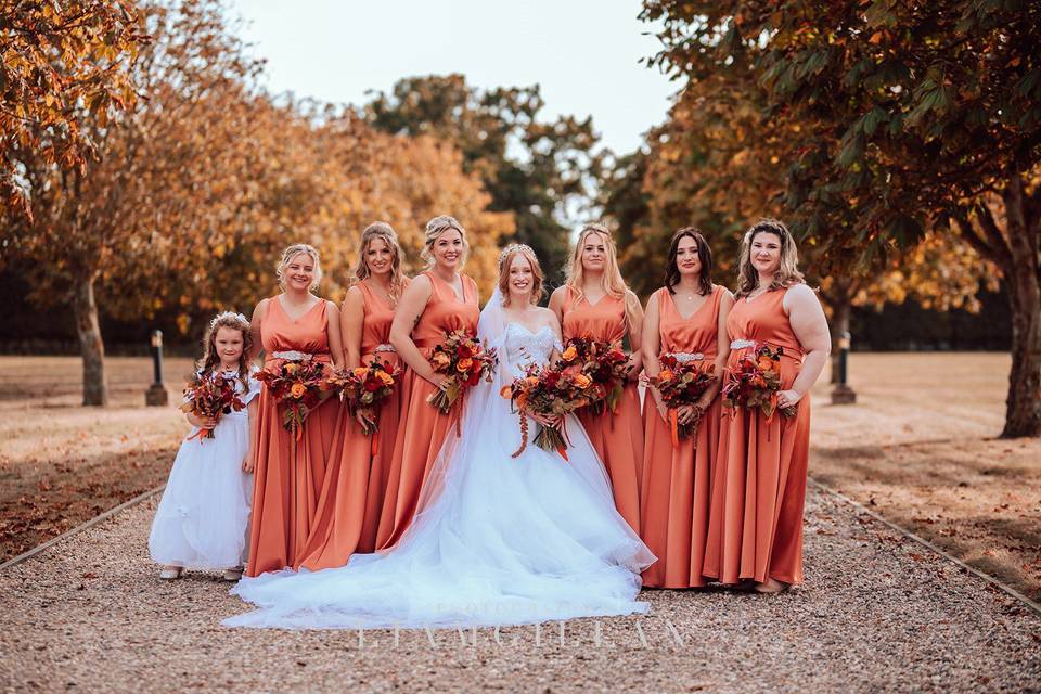 Orange bridesmaids flowers
