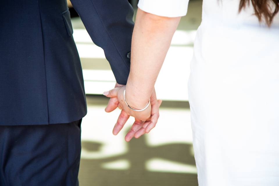 Couple holding hands