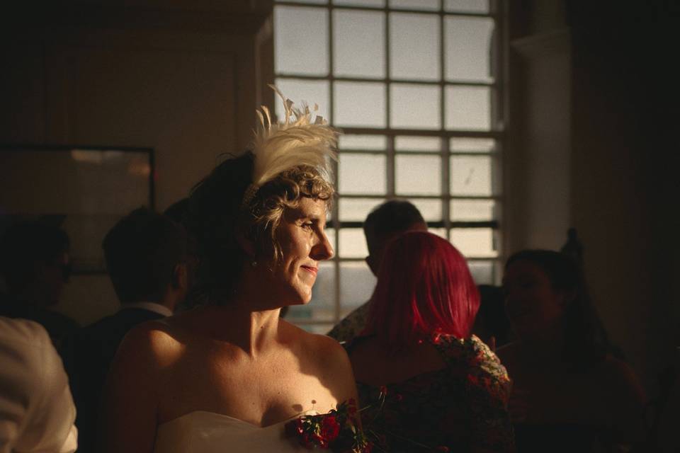 Bride dancing in light