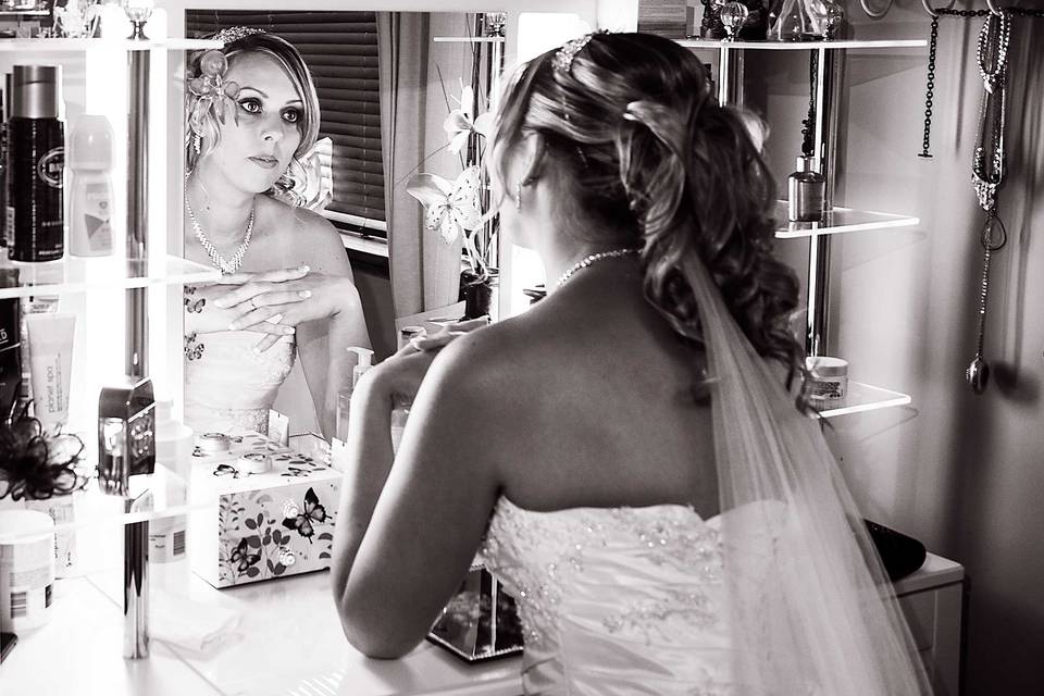 Bride looking in the mirror