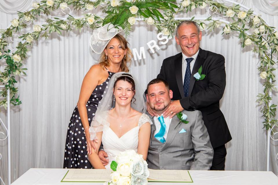 Bride and groom aisle outside