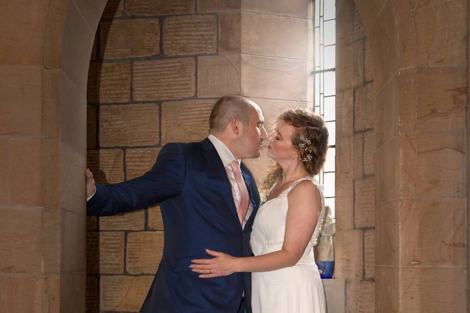 Bride and groom by the lake