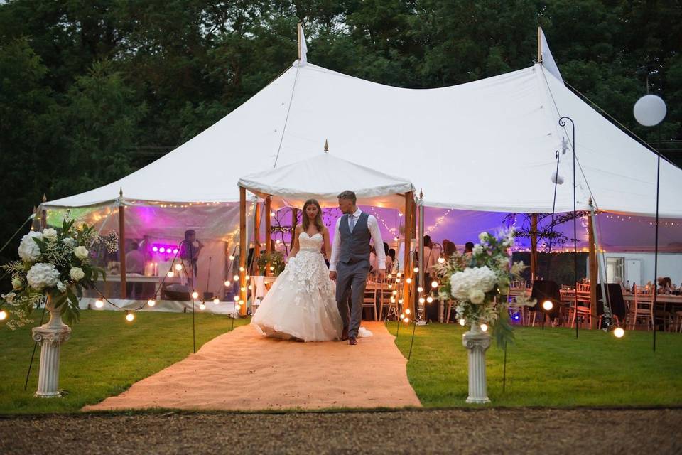 Lit-up tents by night