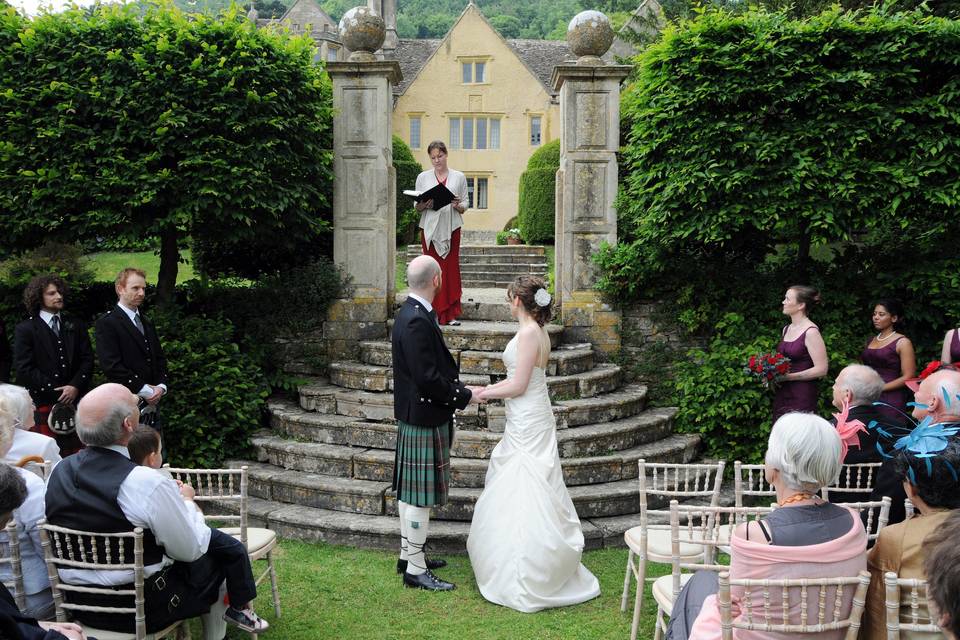 Humanist ceremony on the steps in front of the manor house