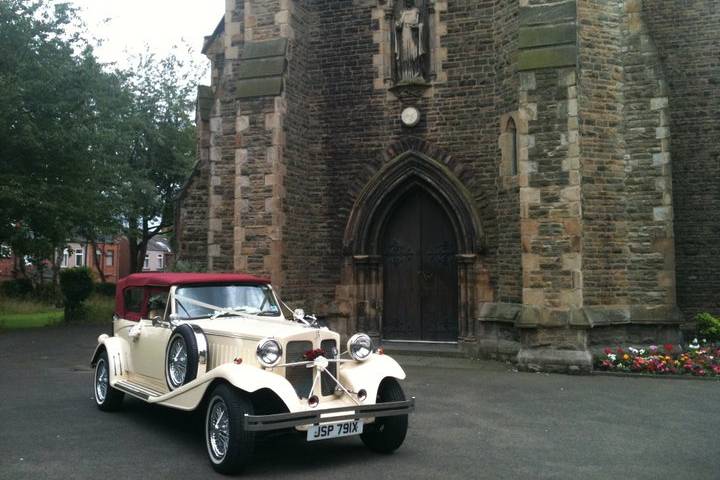 Burgundy Beauford convertible