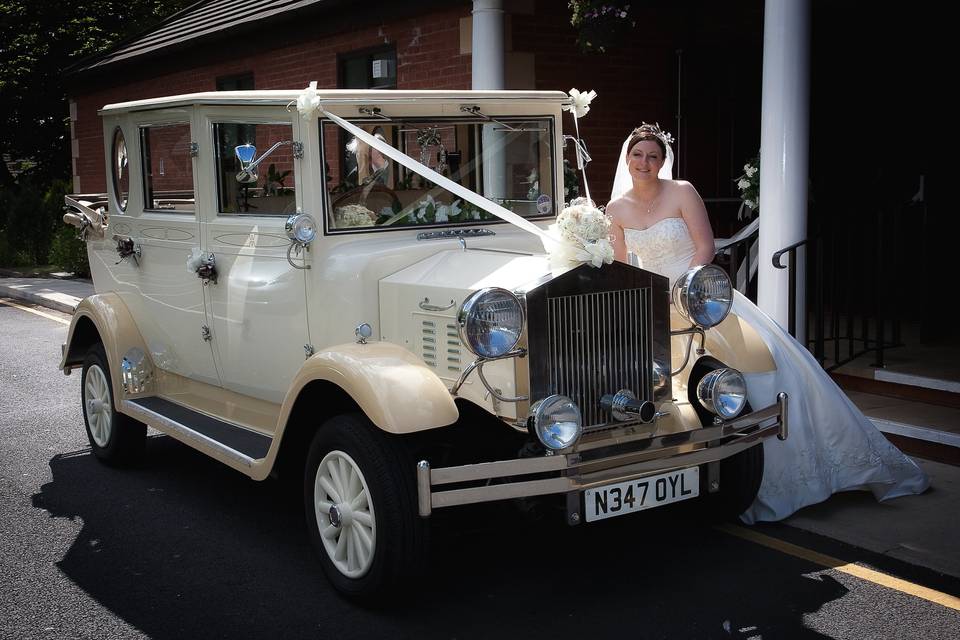 Cream vintage wedding car