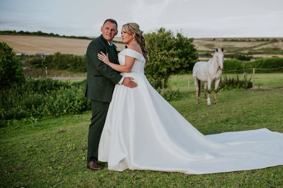 Couple shot with horse