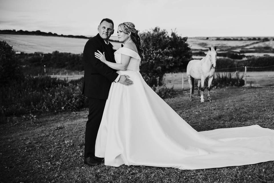 Couple shot with horse b&w