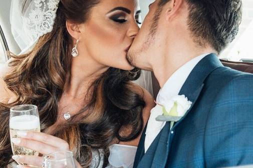 A kiss in the wedding car