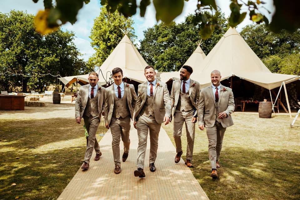 Tipis and groomsmen