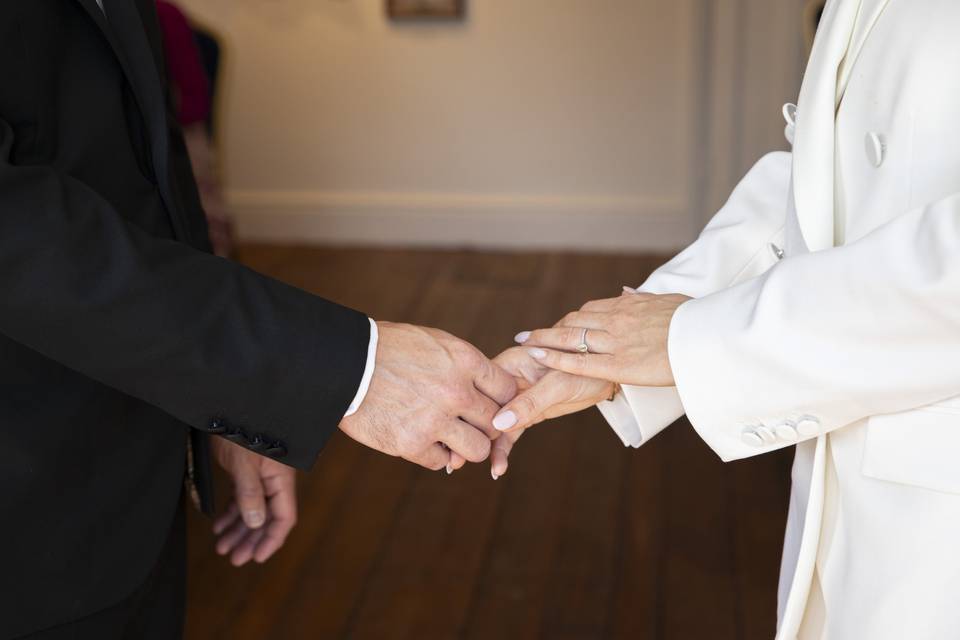 Bride and groom holding hands