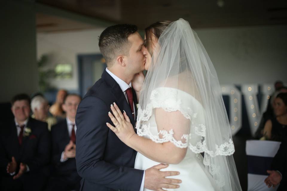 First kiss as bride & groom