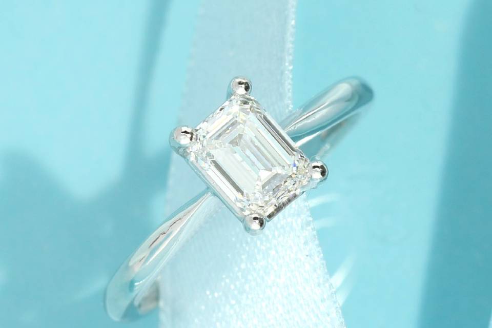 Emerald cut solitaire ring