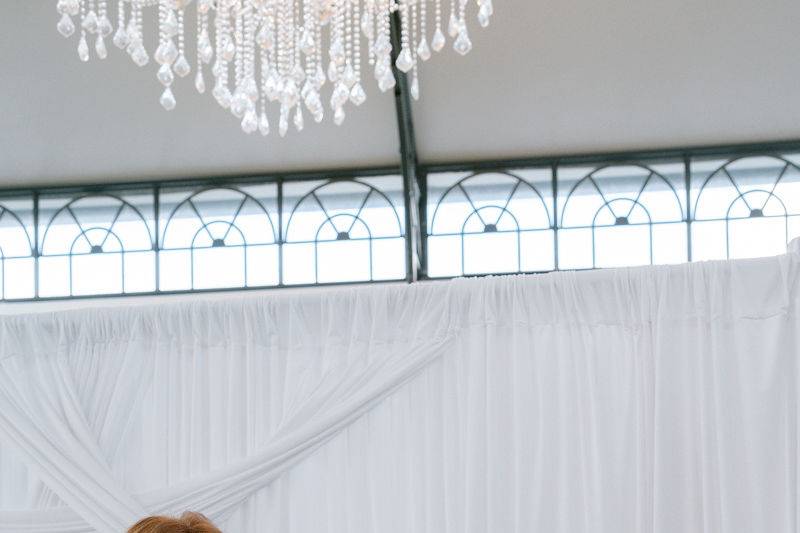 White draped back drop