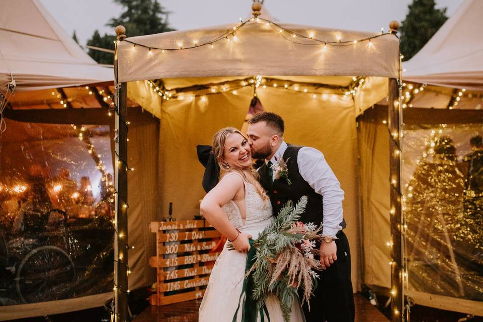 Sparkly rainy teepee wedding