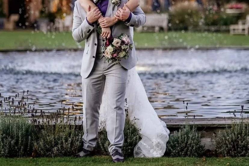 Smiling by a fountain