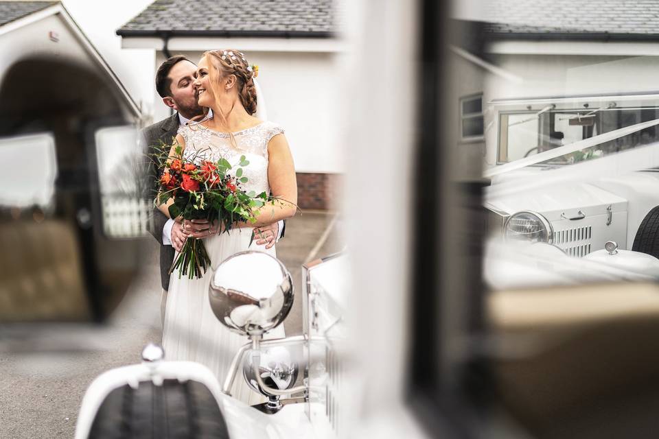 Bride groom and cars