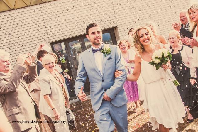 Bride and groom exit confetti