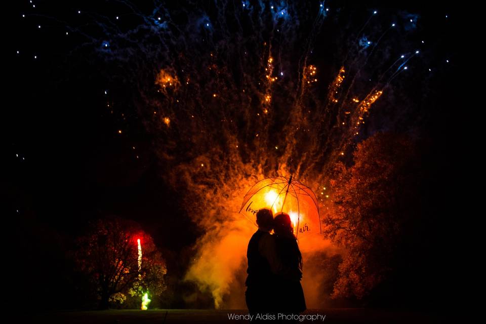 Silhouette and fireworks