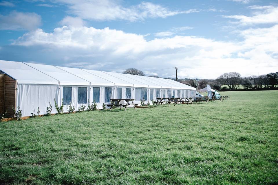 Marquee & picnic benches