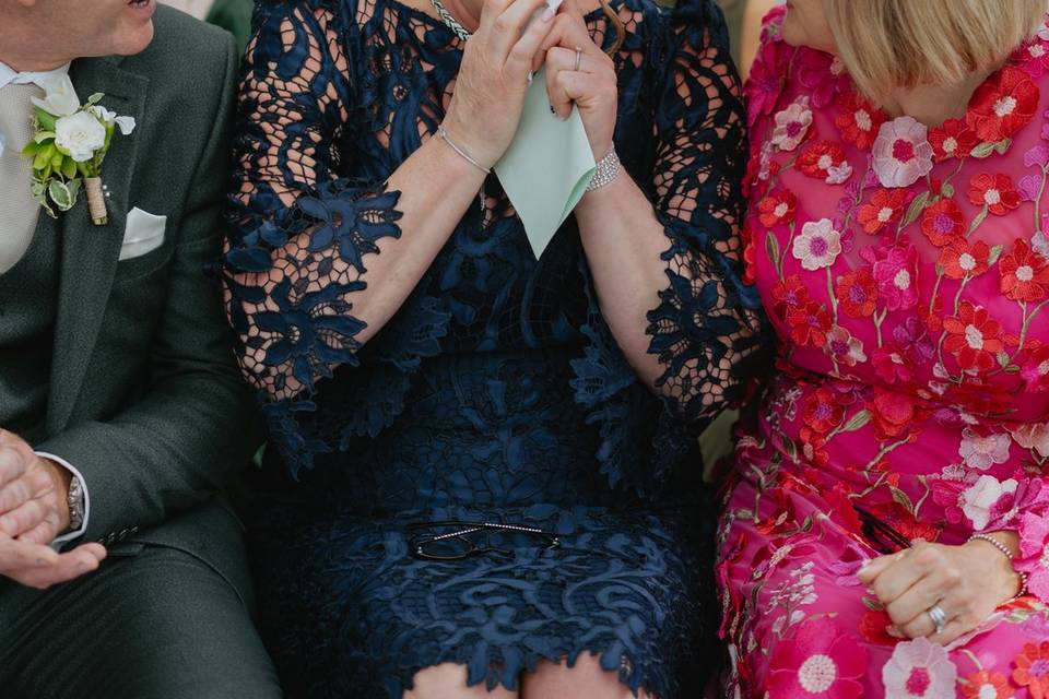 Mother crying at ceremony